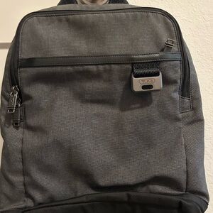 Small TUMI backpack for travel